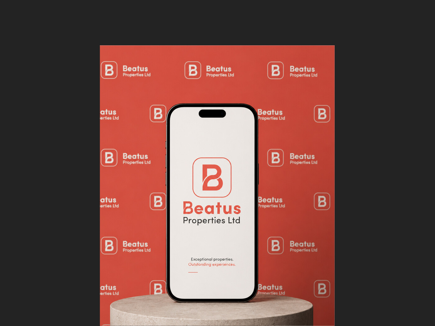 Beatus Properties branded backdrop and mobile app screen