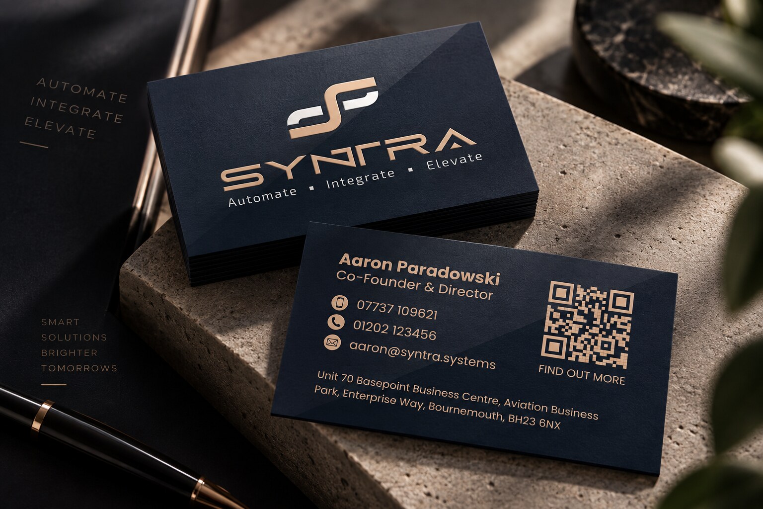Syntra business cards in navy and champagne